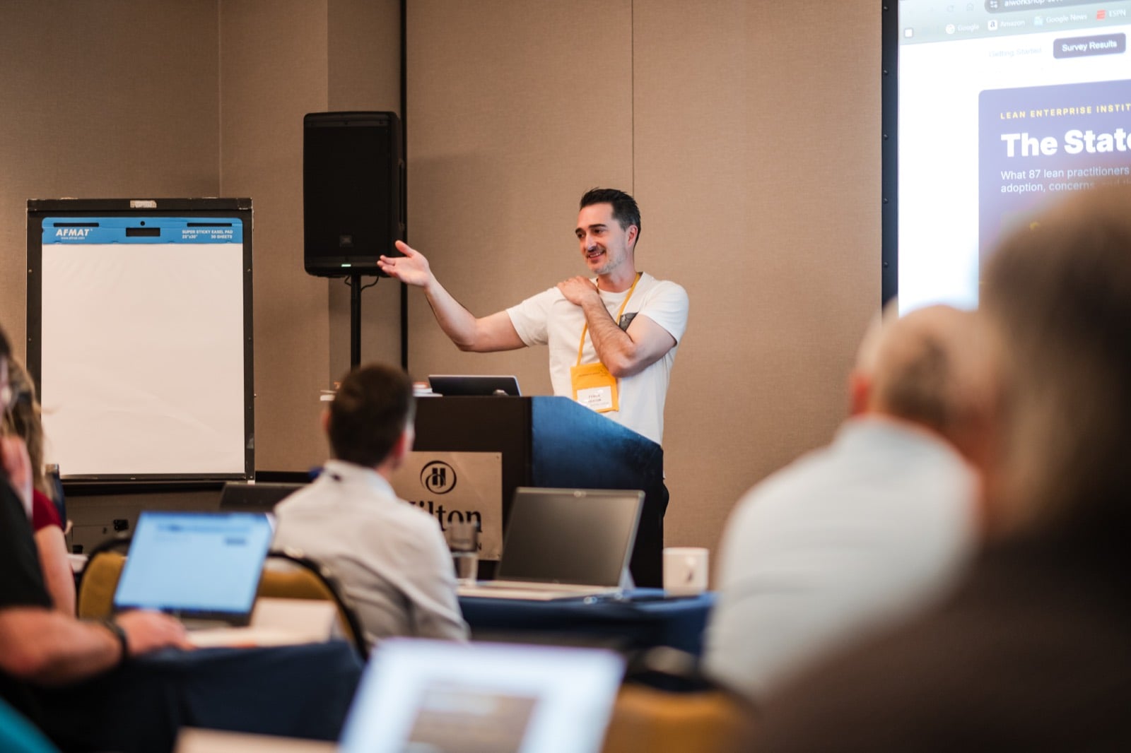 Tyson Heaton presenting the state of AI and lean to a room of practitioners